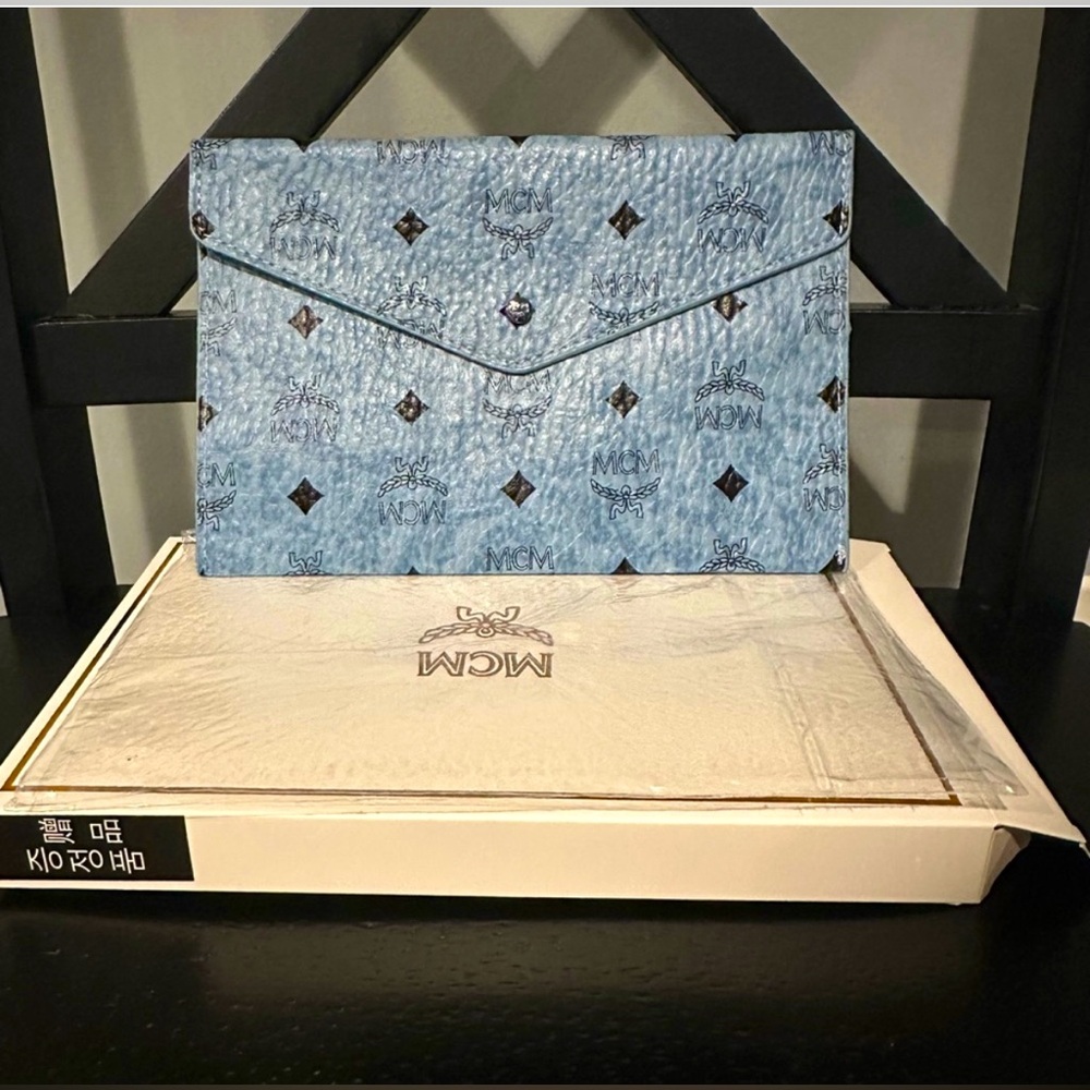 🆕 MCM Blue Monogram Clutch w/ box.